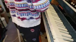 Cleaning The Keys On The Bottom Manual Of A Hammond Organ