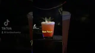 Tropical Rum Punch -  #TropicalCocktail #CocktailTok #RumLovers #TikiVibes #reggae #bobmarley