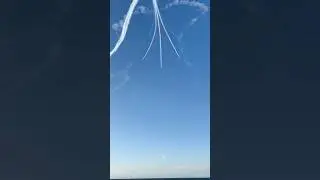 RAF Royal Airforce Red Arrows display team smoke on vertical break in the blue sky of Malta Airshow