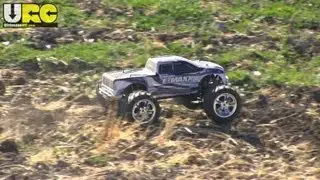 Stock brushed E-MAXX on rougher terrain, no music