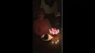 Mom gets a surprise birthday candle! Priceless!