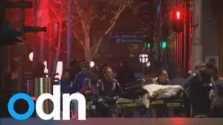 Sydney hostage siege ends after armed troops storm cafe