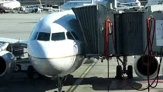 Airplane Docking at the Gate - Awesome Coupling A 320 with Aero Bridge SFO Gate 92