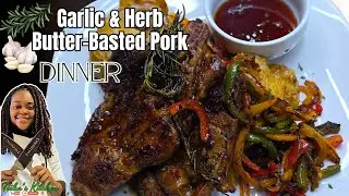 Garlic Herb Butter-Basted Pork , Cheesy Cajun Smashed Potatoes & Roasted Bell Peppers.