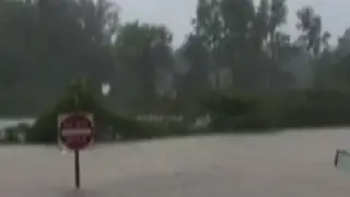 Raw: Woman and Child Rescued from Flooded Car