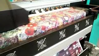 Sublimation printer printing directly on polyester fabric.