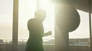 Boxing Energy: Woman Training with a Punching Bag | RFV - No Copyright