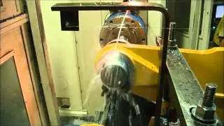 Steiner Autofacer performing back spotface on heavy equipment part
