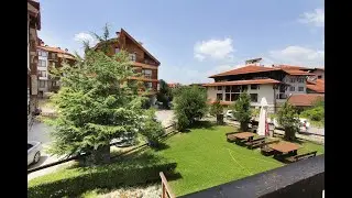 Тристаен апартамент с камина за продажба в жилищна сграда в Банско