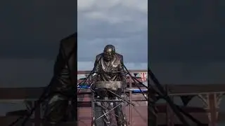 The original and first statue of Captain Tom Moore being transported in Leeds 2021