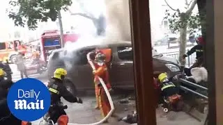 Firefighters battle fierce van fire in Shanghai, 18 injured - Daily Mail
