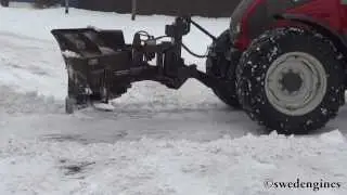 Valtra N141 Plowing snow
