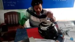 My presentation through empty sprite bottle n helmet