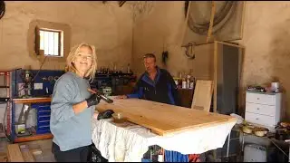 A rustic sliding door & renovating old stone walls - Finca restoration in Spain