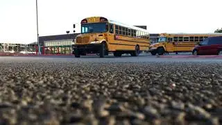 School buses driving away