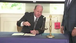 Polis announces $250M in budget cuts, redirected funds to balance state budget