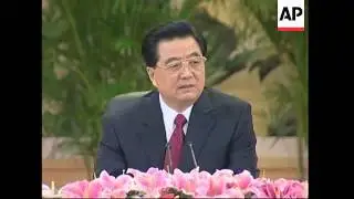 President Hu Jintao talks to media at Great Hall of the People