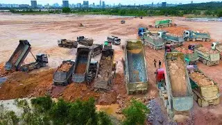 amazing Super 130 Truck Moving Dirt For Lake Reclamation Huge Land Filling Up Project In The Lake