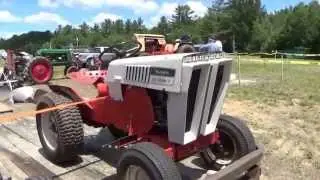 Three Old Sears Lawn Mowers and one Hummy