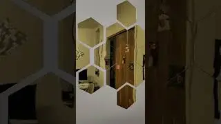 gold mirror plate on wall #golden #decor