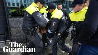 Protester charges at Emmanuel Macron in the Netherlands