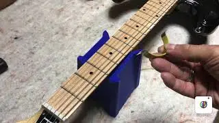How to use guitar string spreaders. Get at your frets/fretboard without having to remove strings.