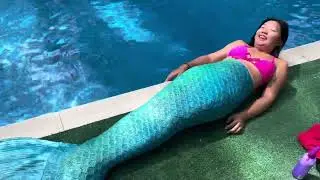 Seeing if I sink in my mermaid tail