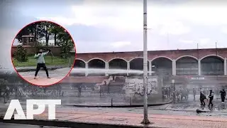 WATCH | Arrows Fly at Police Near US Embassy in Bogota | APT