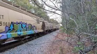 CSX 7011 and CSX 499 lead a south bound grain train Friday morning 1/2/2026