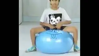 Boy bouncing on Hopper ball