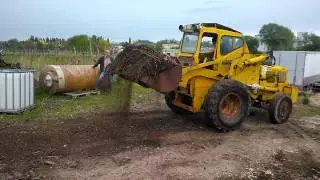 1964 Weatherill 42-H wheel loader moving dirt