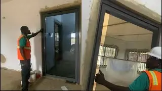 Building in Ghana🇬🇭|| Interior Glass Door Installation…they broke the glass🙁 #buildinginghana