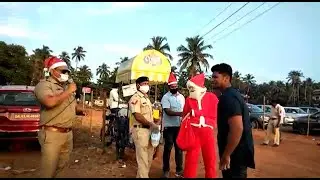 Goa police dresses up as Santa to spread COVID19 awareness! Gift chocolates and masks