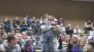 Boy hugs dad for first time in a year
