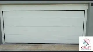 Single Line Design Sectional Overhead Garage Door by CRUST Technical Services LLC