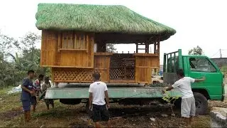 Moving a Bahay Kubo - Nipa Hut - Bayanihan - Transporting 2 of 3