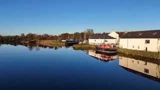 The River Nith flowing past Kingholm Quay in Dumfries.