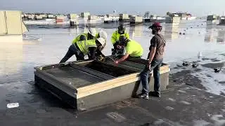 Helicopter HVAC install 20 ton rooftop unit at Katy Mills mall for Tommy Hilfiger replacement
