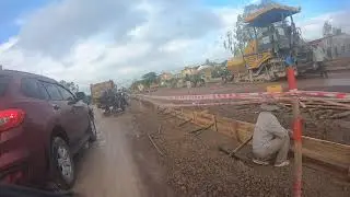 Ride a motorcycle to Phu Cat Airport when it's rain