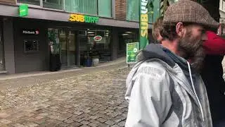 Paul Rapley ministers to a man with neck pain in Norway.