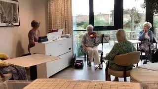 Enjoying violin at Edwalton manor care home in Nottingham