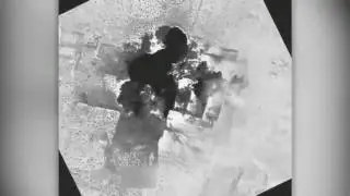 Coalition airstrike destroys an ISIS-held building near Al Bab, Syria.