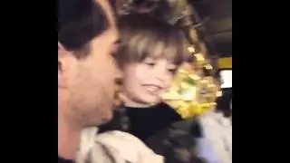 Francisco Lachowski and Milo in restaurant 