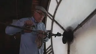 Historic Buffalo church clock reset by hand for daylight saving time