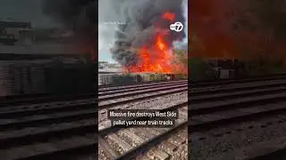 New video shows fire burn down Chicago pallet yard near train tracks