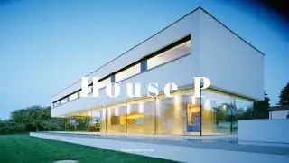 Modern house design ,The building is cube shaped with courtyard garden and large glass