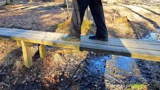 Man Walking Along a Wooden Boardwalk #reversevideo #finland