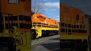 CSX Q388 with 9 engines and P&W 4052 C40-8 standard cab trailing at Fairport NY crossing