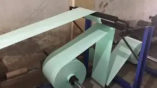 Polycoated paper envelop machine with gluing attachments