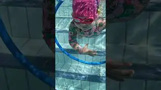 Baby Swim Floating Through The Hoop #swimming #pool #underwater #learning #floating #swim #learn